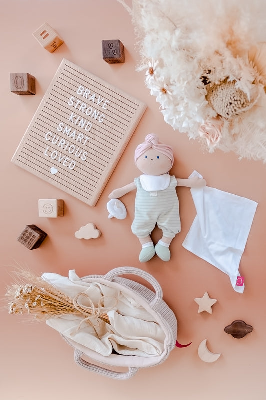 Baby with Knitted Carry Cot
