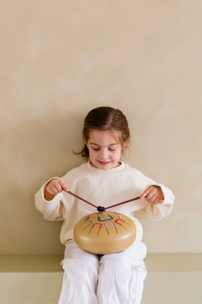 
                  
                    Tambú Tongue Drum
                  
                