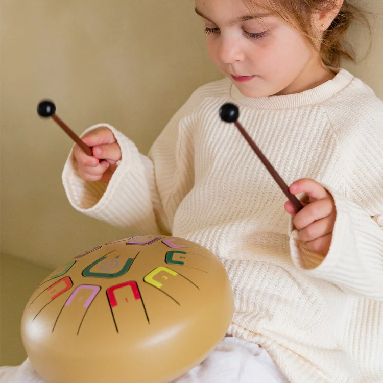 
                  
                    Tambú Tongue Drum
                  
                
