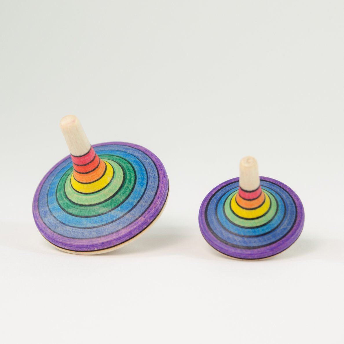 Mader _ large rallye spinning top rainbow red top compared small _ Little Toy Tribe