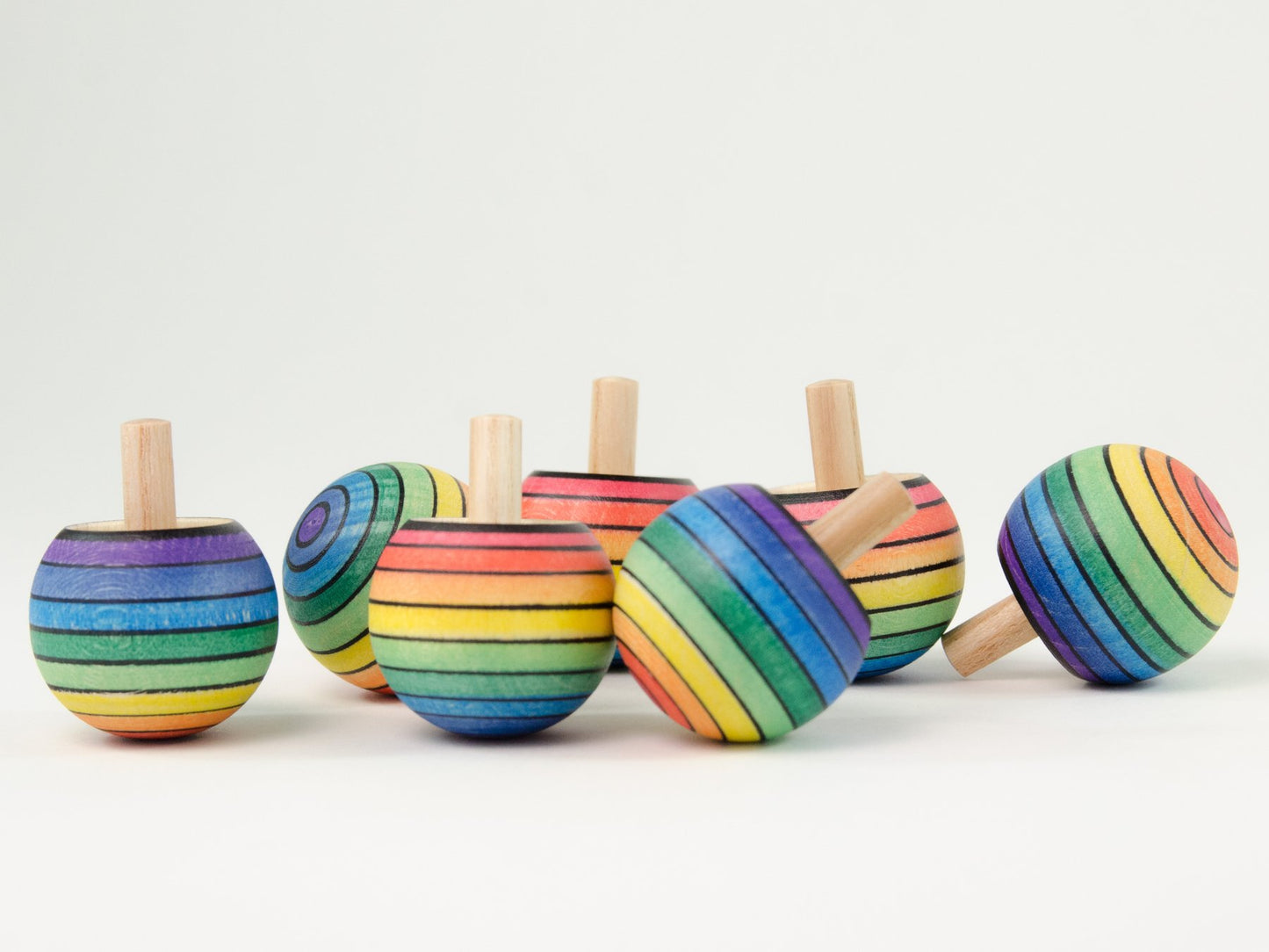 Mader _ spinning turn top rainbow side _ Little Toy Tribe