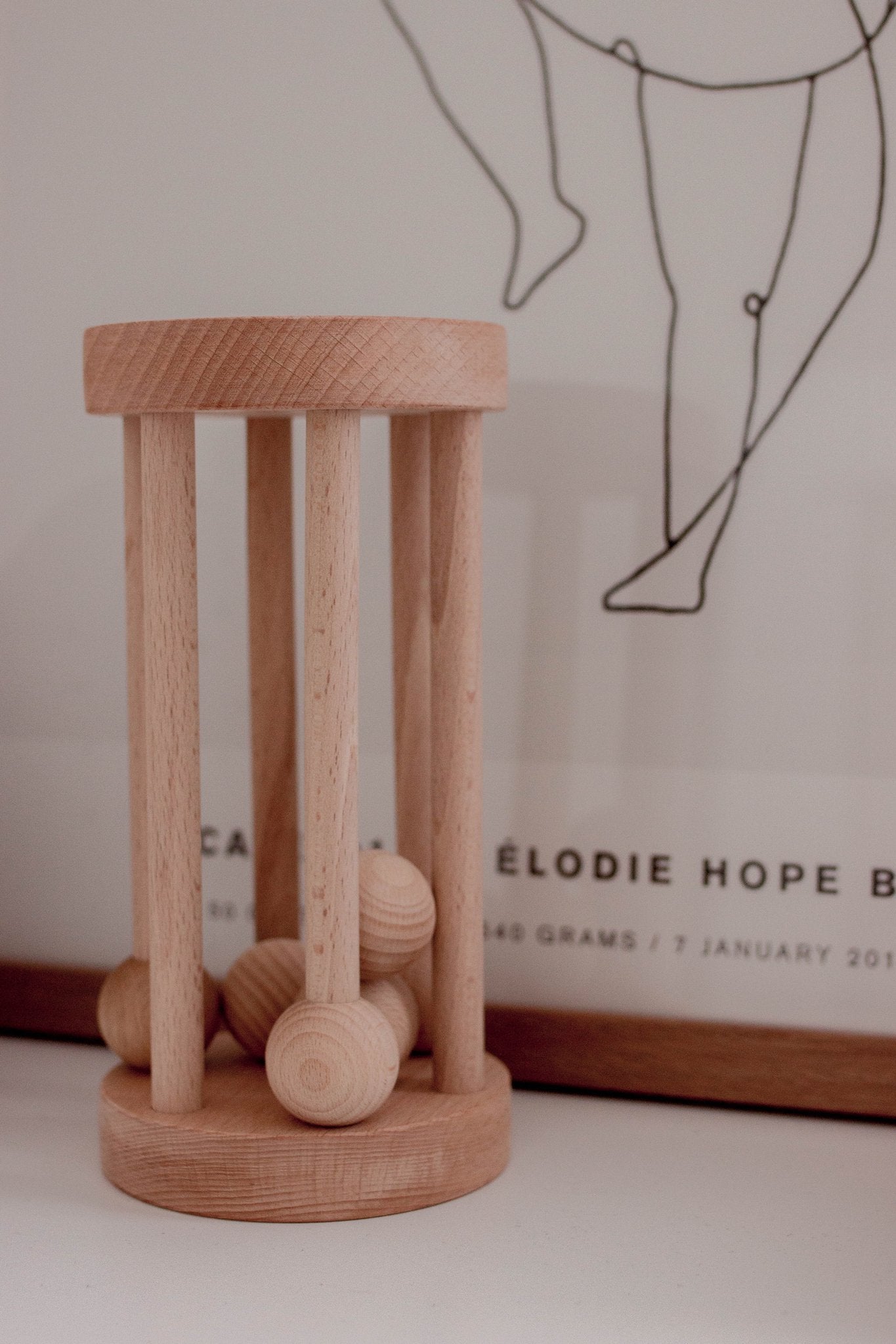
                  
                    Wooden Rolling Rattle
                  
                